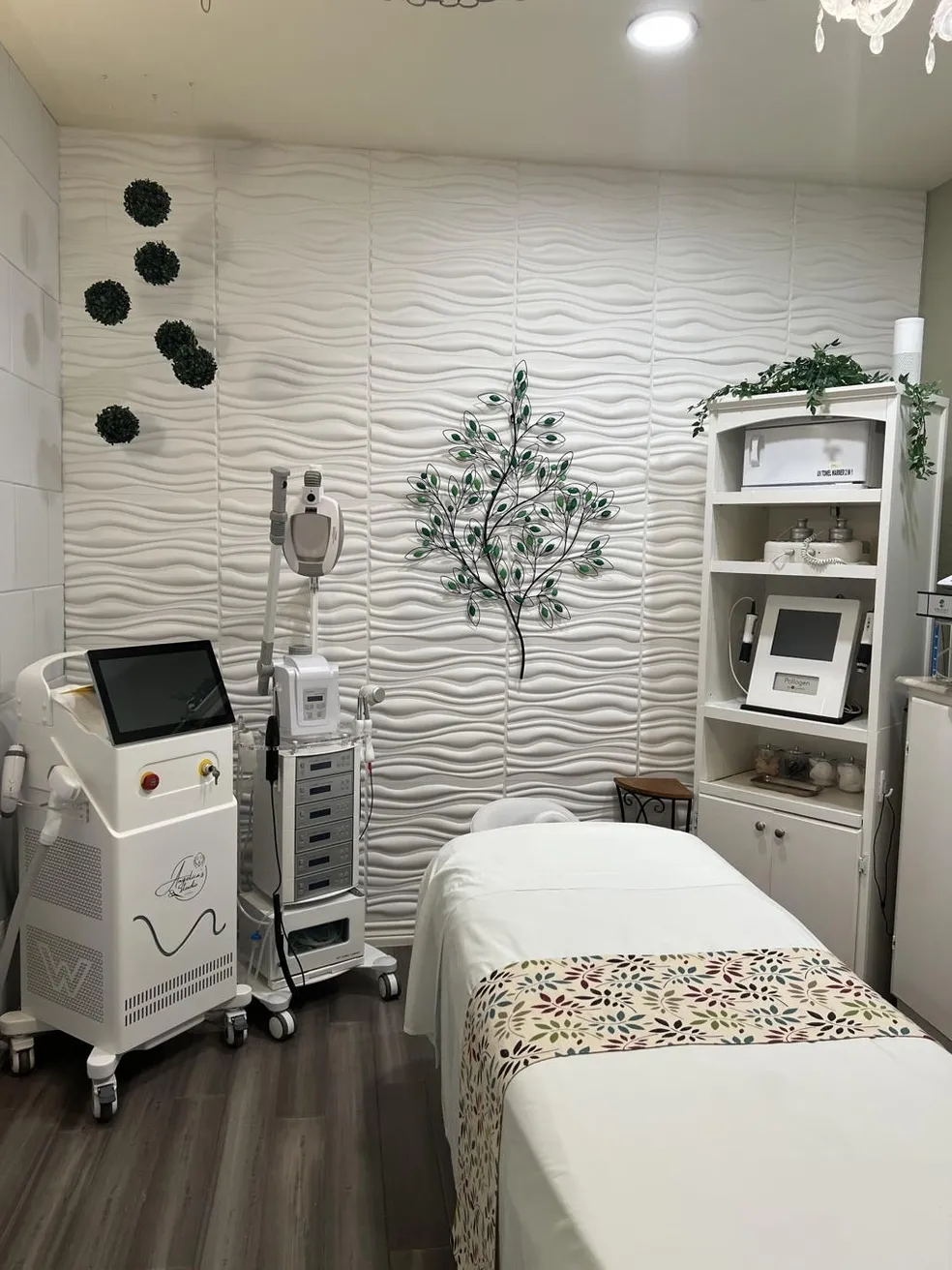 Modern spa treatment room with equipment