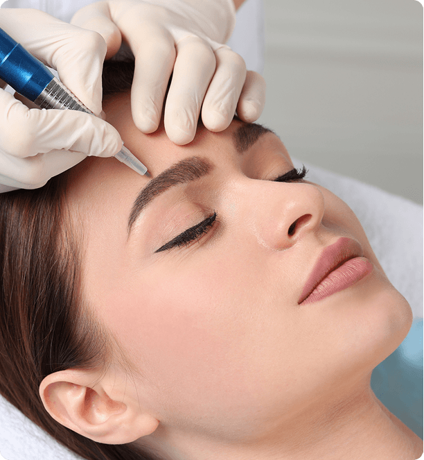 Eyebrow tattoo procedure close-up